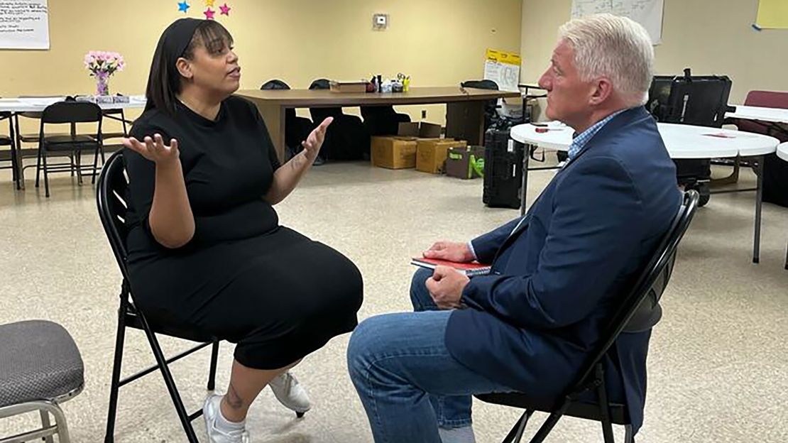 King speaks to BLOC executive director Angela Lang at the group's headquarters in Milwaukee in October.